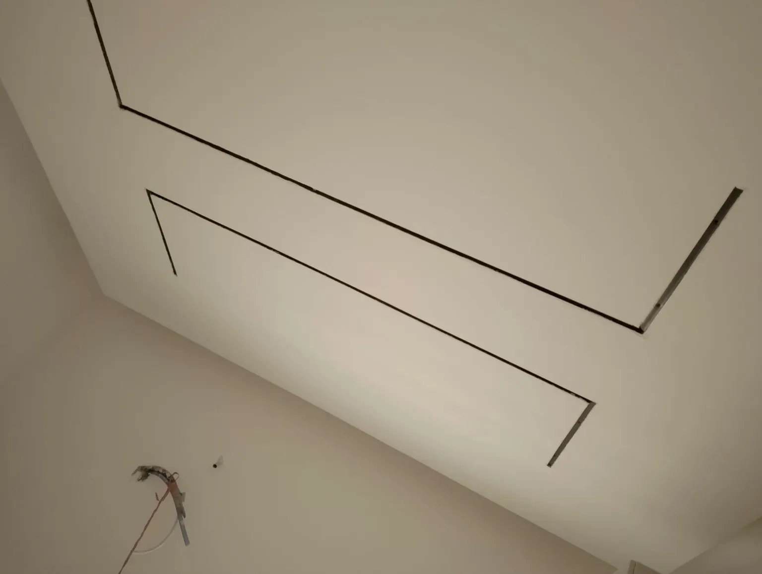 Accent ceiling track layout prepared for architectural lighting