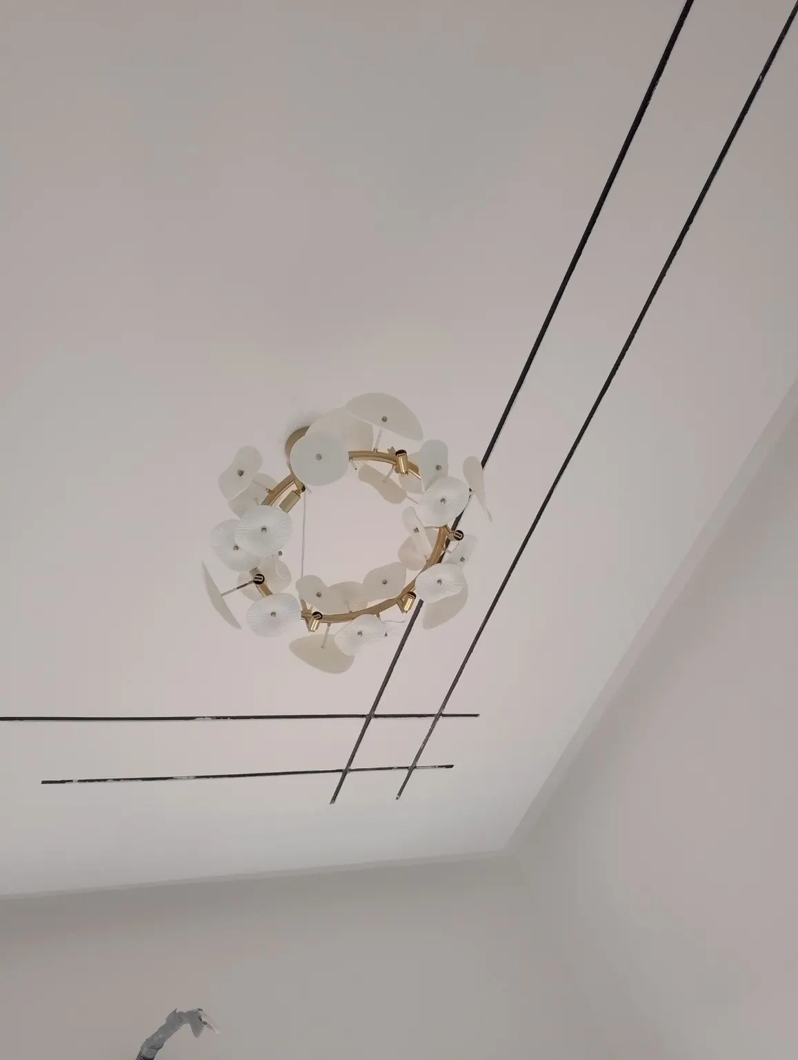 During evidence for POP Line Lighting & Chandelier Install